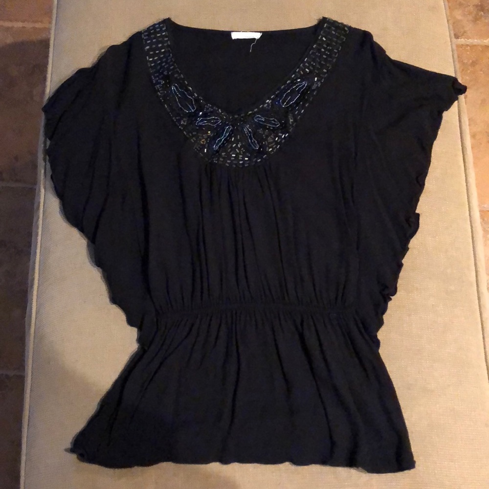Very cute black top with flowy sleeves